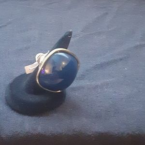 Gold toned blue ring
